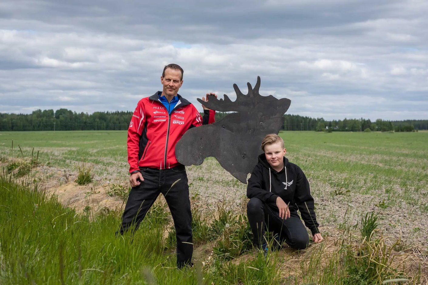Kariniemen kotitila Tattisen tila isä poika